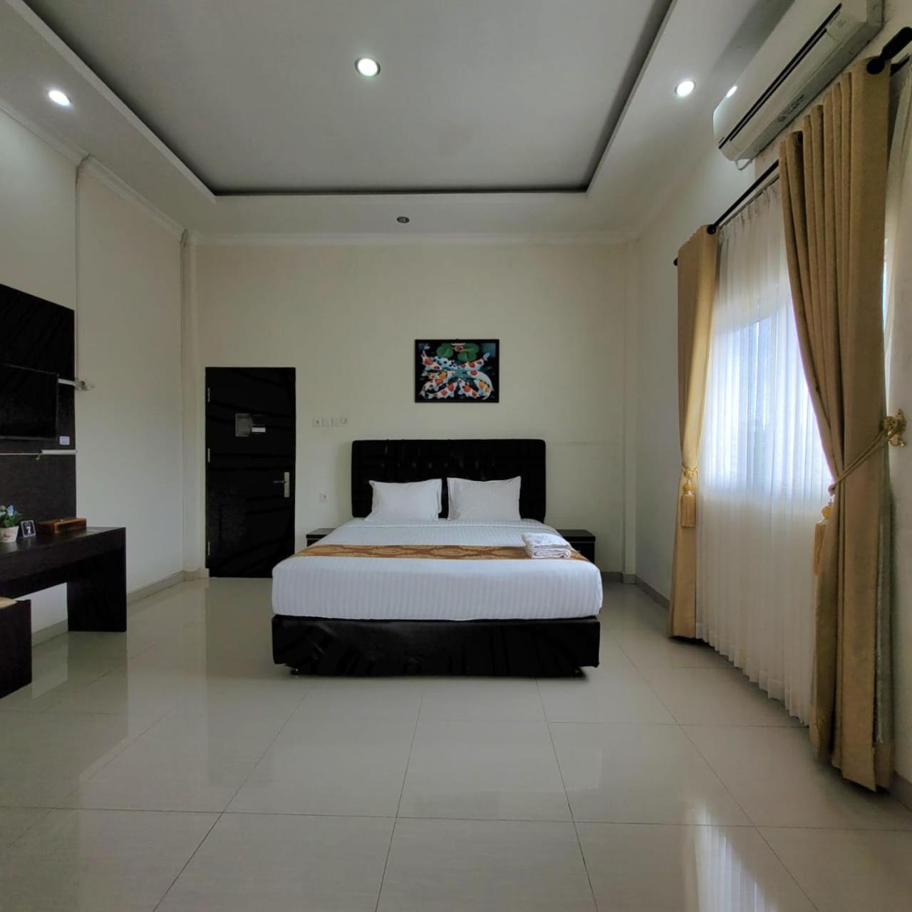 Mahakam Guest House Padang  Oda fotoğraf