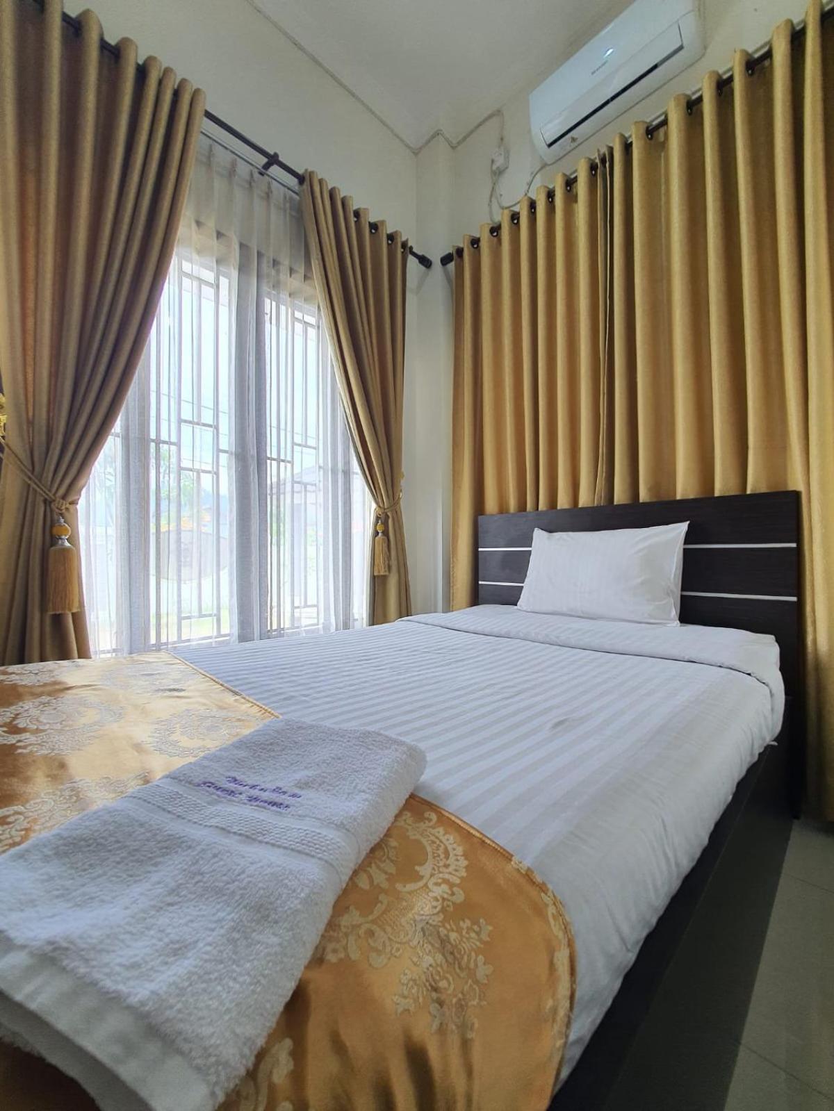 Mahakam Guest House Padang  Oda fotoğraf